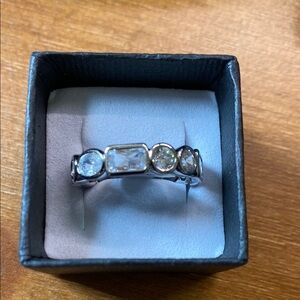 Silver Three-Stone Ring with Delicate Prong Setting